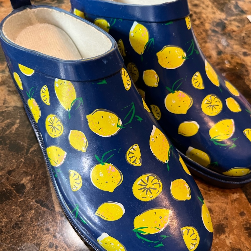 Woman size 6 Slip on Water boots. Cute bright, cherry lemons, Never worn NWOT.